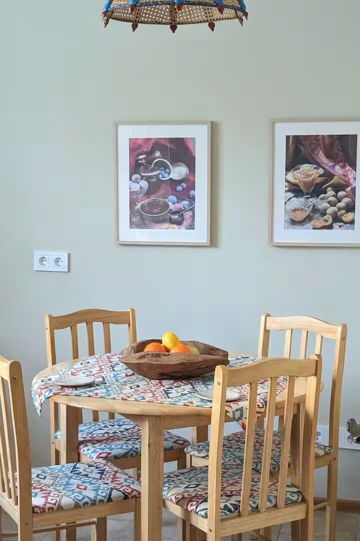 Dining area — Kazakh ikat tablecloth, food photographs